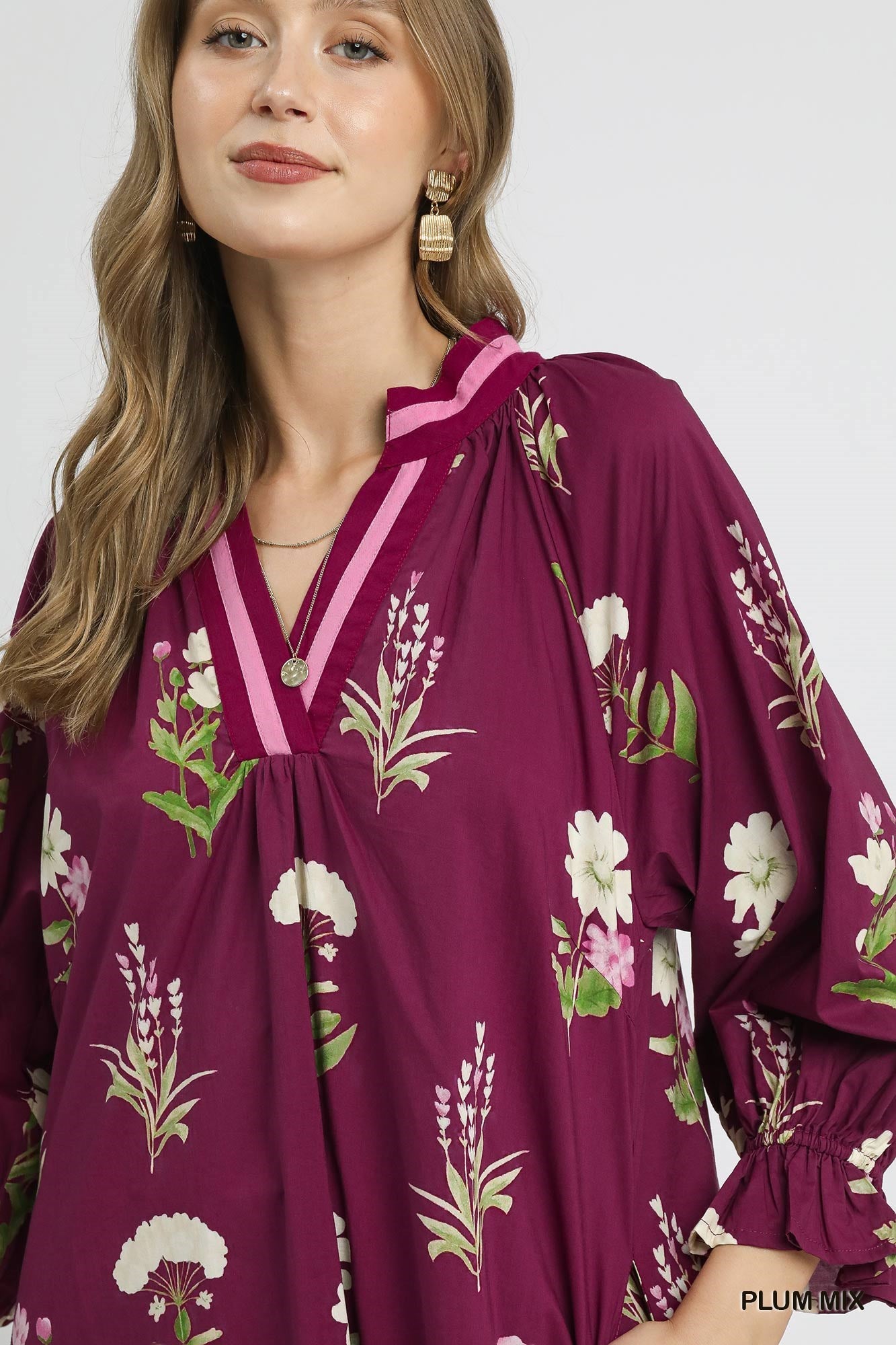 Magenta Floral Tunic Dress with green and white print, contrast trim, long sleeves, V-neck. Available in sizes XS-XL.