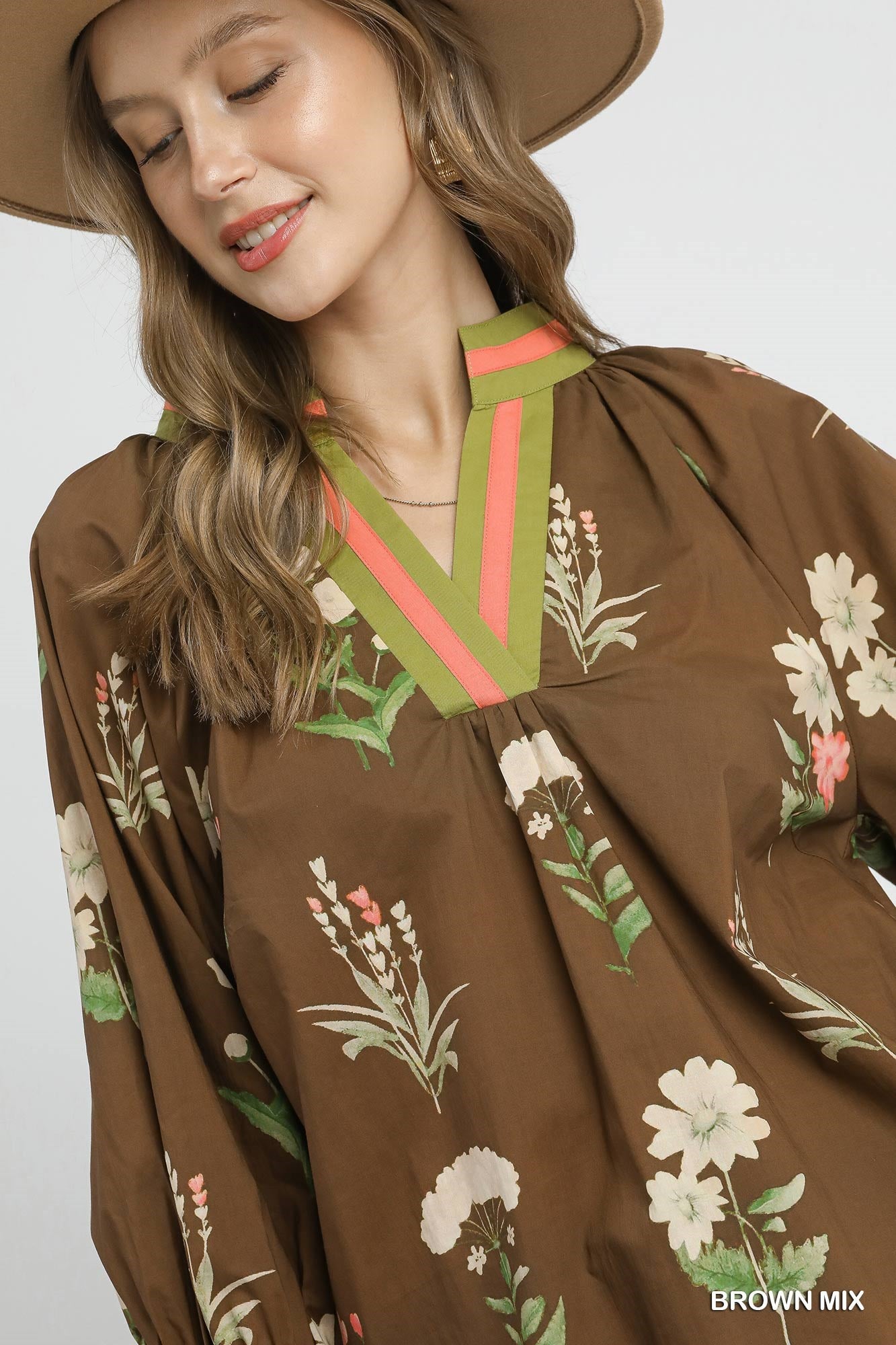 Sienna Floral Contrast Trim Blouse, available in XS–XL. Features floral pattern with contrast trim details.
