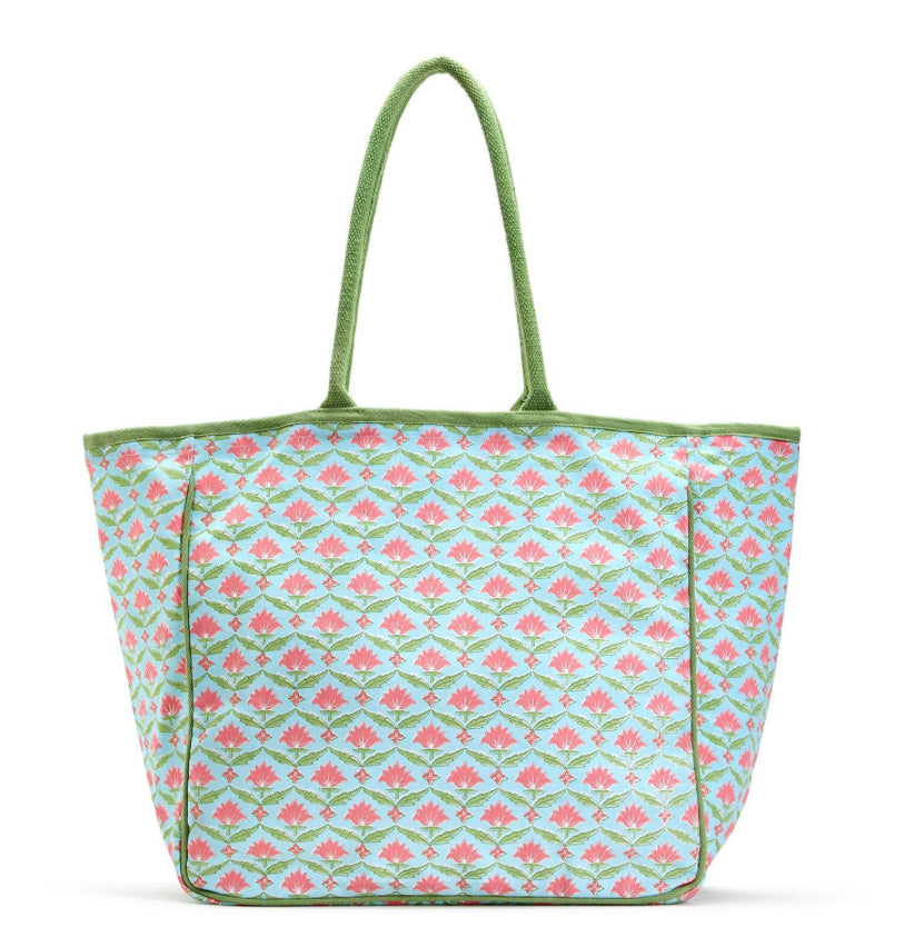 Spacious cotton canvas tote with green handles, light blue background, pink and green floral print. Sizes: S, M, L.