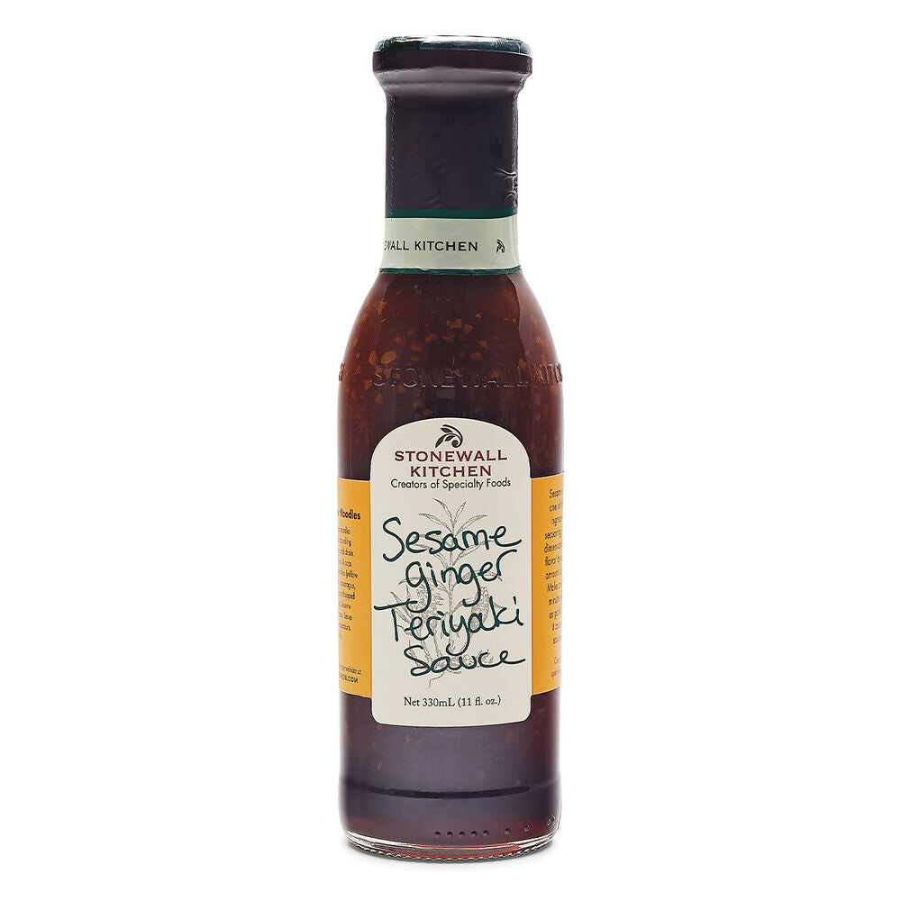 Sesame Ginger Teriyaki Sauce 11 oz bottle with tan label, black script text, dark cap; dark brown sauce inside.