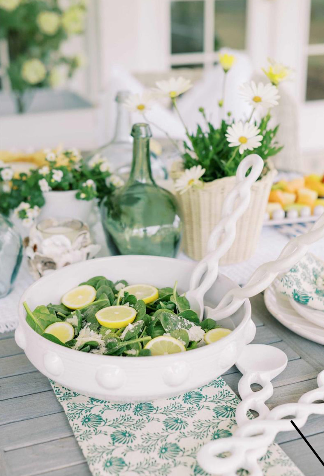 Beaded Serving Bowl, 12" diameter, shown holding salad with lemon slices. Available size: 12 inches.