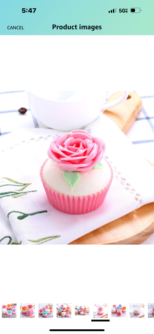 Faux cupcake with pink frosting petals and green leaves. Available sizes: small, medium, large.