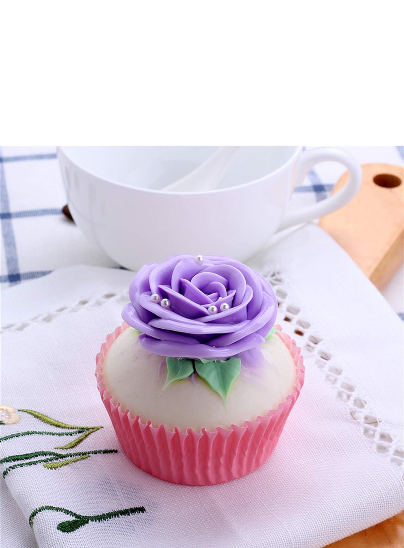 Faux cupcake with pink wrapper, purple rose frosting, silver beads. Available in small and medium sizes.