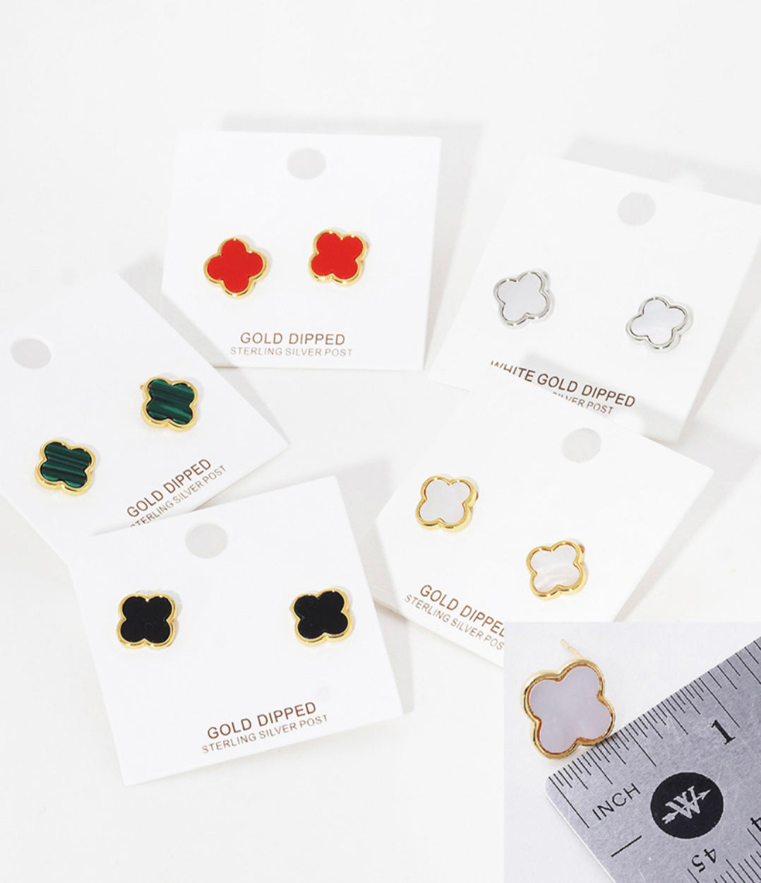 Gold dipped quatrefoil stud earrings, assorted colors, about 0.5 inch. Made in Korea, lead and nickel compliant.