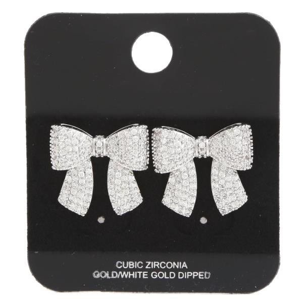 Rhinestone & Metal Bow Earrings: Cubic Zirconia, Gold/White Gold Dipped; presented on a black display card. Sizes available: One size.