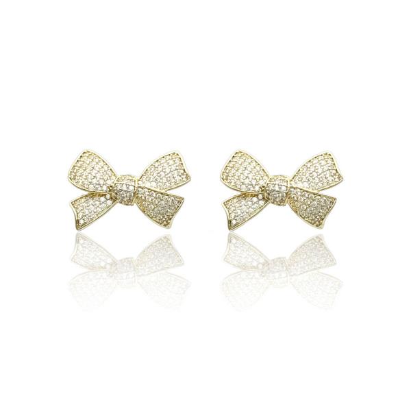 The Rhinestone & Metal Bow Earrings feature dazzling stones for a captivating sparkle. Available in one size.