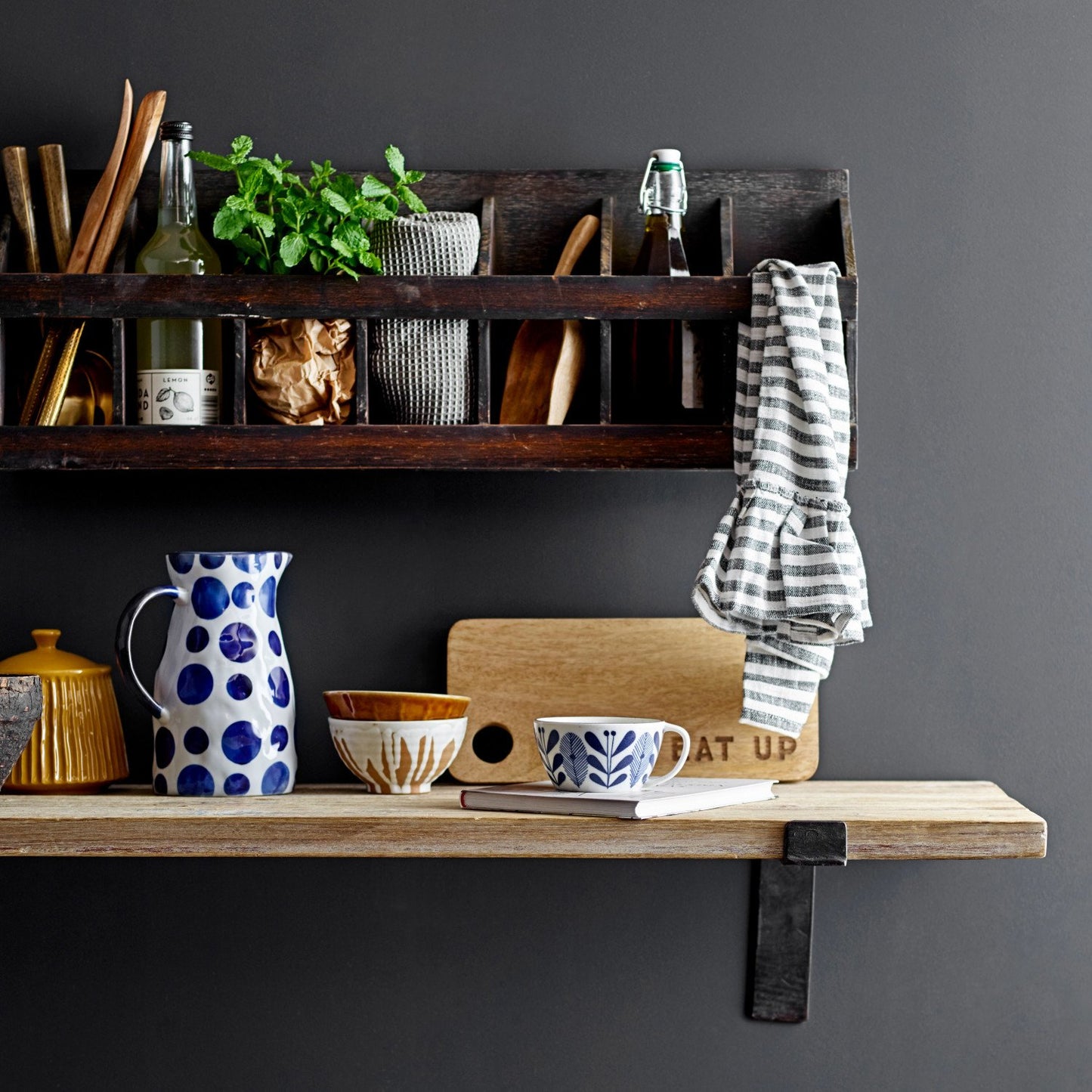 Hand Carved Mango Wood Scoop shown on countertop. Available sizes: small, medium, large.