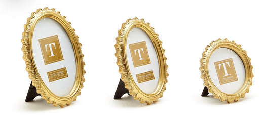 Set of three ornate, oval Falcate Gold Frames with scalloped edges; available in small, medium, and large sizes.