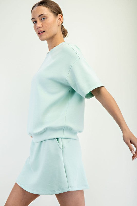 Light blue Modal Scuba Top, fitted design, available in sizes XS–XL.