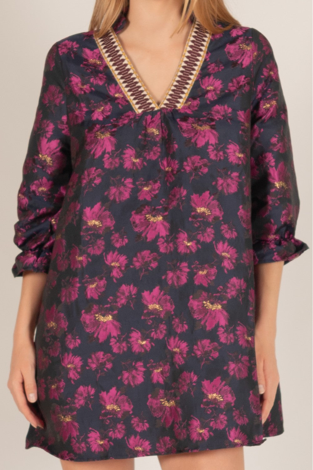 Floral Jacquard 3/4 Sleeve Dress with Contrast Collar in navy blue. V-neckline, decorative trim. Pink and purple floral pattern. Falls just above the knee.
Sizes available: S, M, L, XL