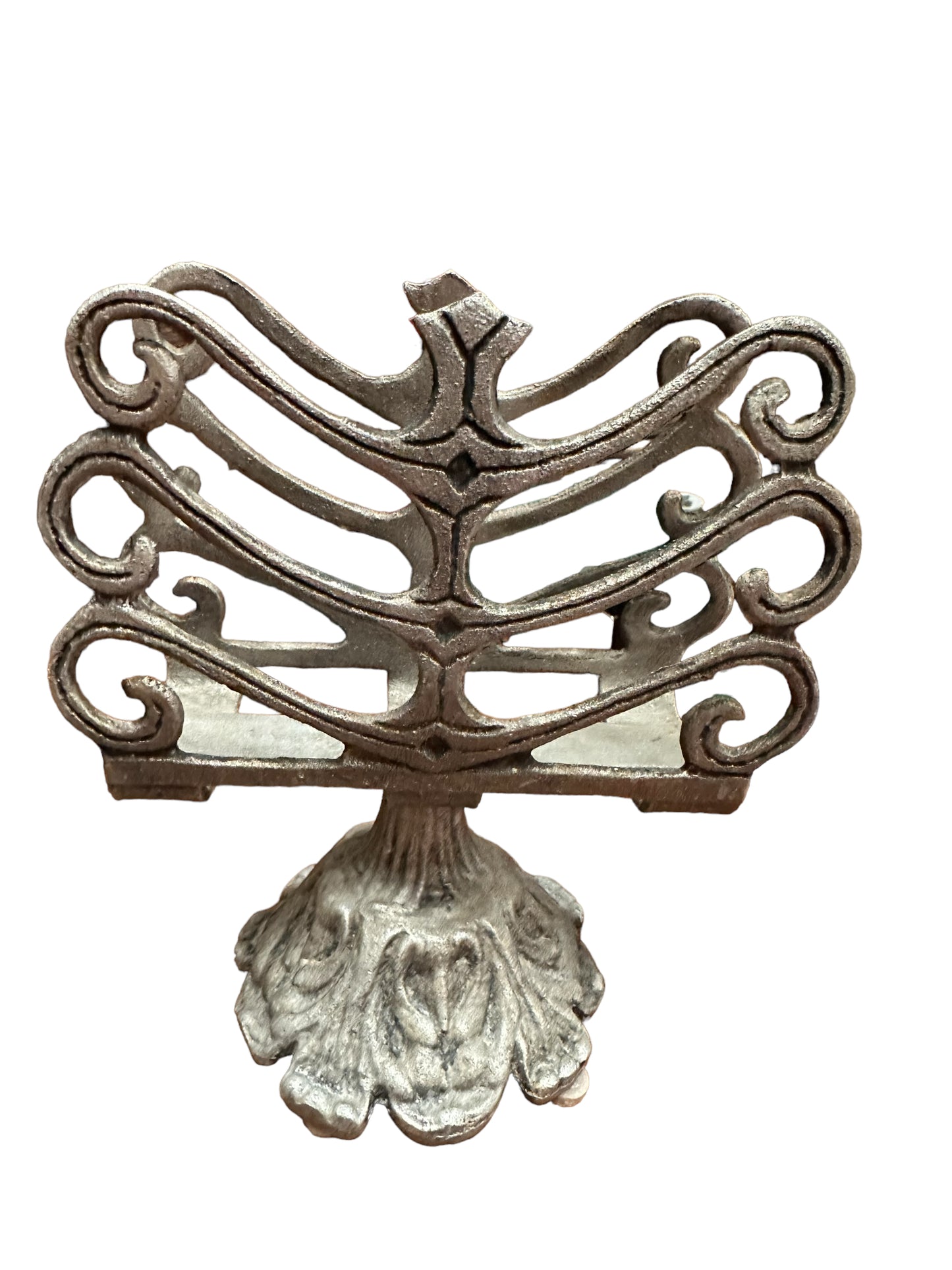 Metal Napkin Holder with ornate scrollwork and leaf-shaped base; available in small (6"), medium (8"), and large (10") sizes.