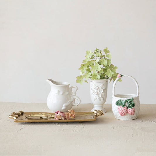 Stoneware Pitcher with Bow Handle on gold tray. Available in small, medium, and large sizes.
