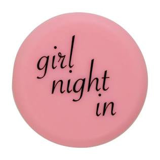 Round pink Wine Cap with “girl night in” in black cursive. Available sizes: standard bottle fit.