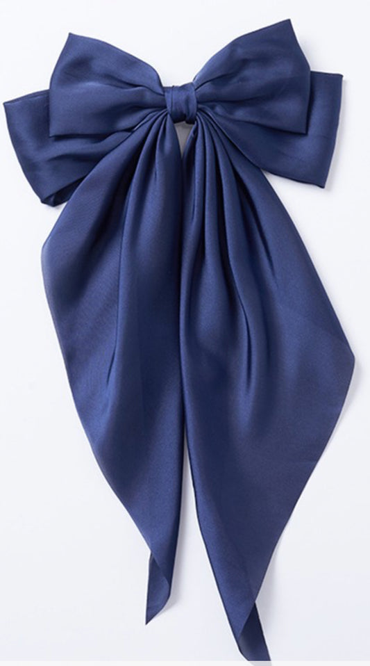 This product is a large, elegant navy blue satin Bow Ribbon Hair Clip. The bow features flowing tails and is made from a silky and smooth fabric. 5” x 12”
Colors Green, Red, White, Black, Milk White, Light Pink, Pink, Blue