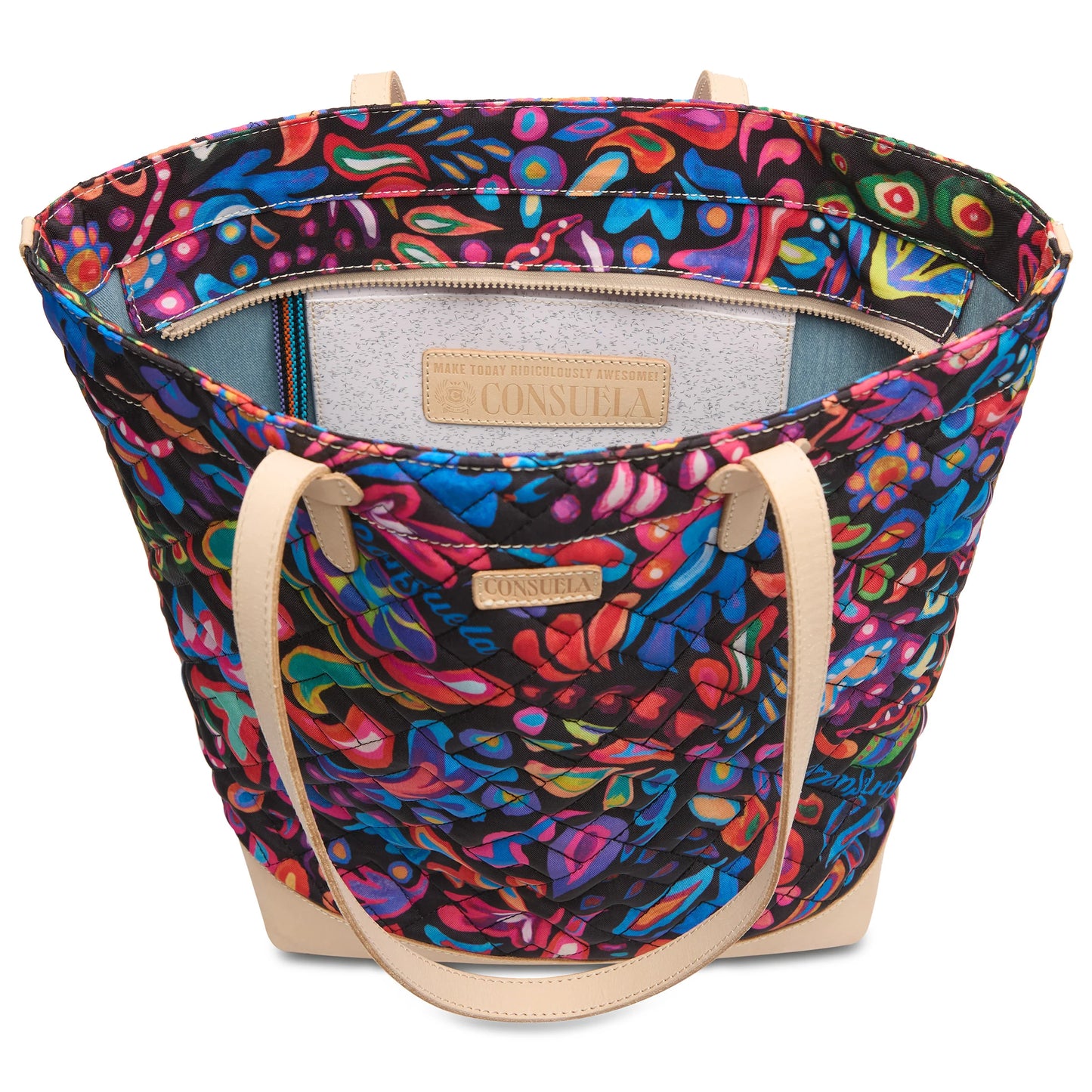 Colorful leather Sam Daily Tote with multicolored abstract pattern, tan handles, roomy interior, beige Consuela label. Sizes: S, M, L.
