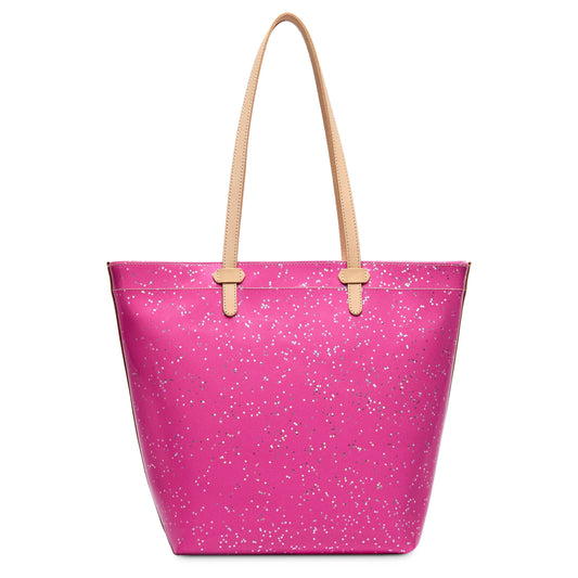 Pink leather Daily Tote in Berry with beige handles, white speckled pattern, spacious interior, and zippered closure. Available in small, medium, and large sizes.