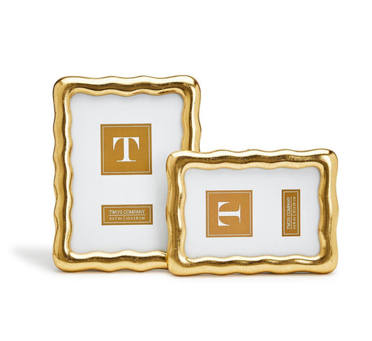 Two Vintage Ore gold leaf photo frames with wavy edges, sizes 4x6 and 5x7, each holds a gold card with a white "T".