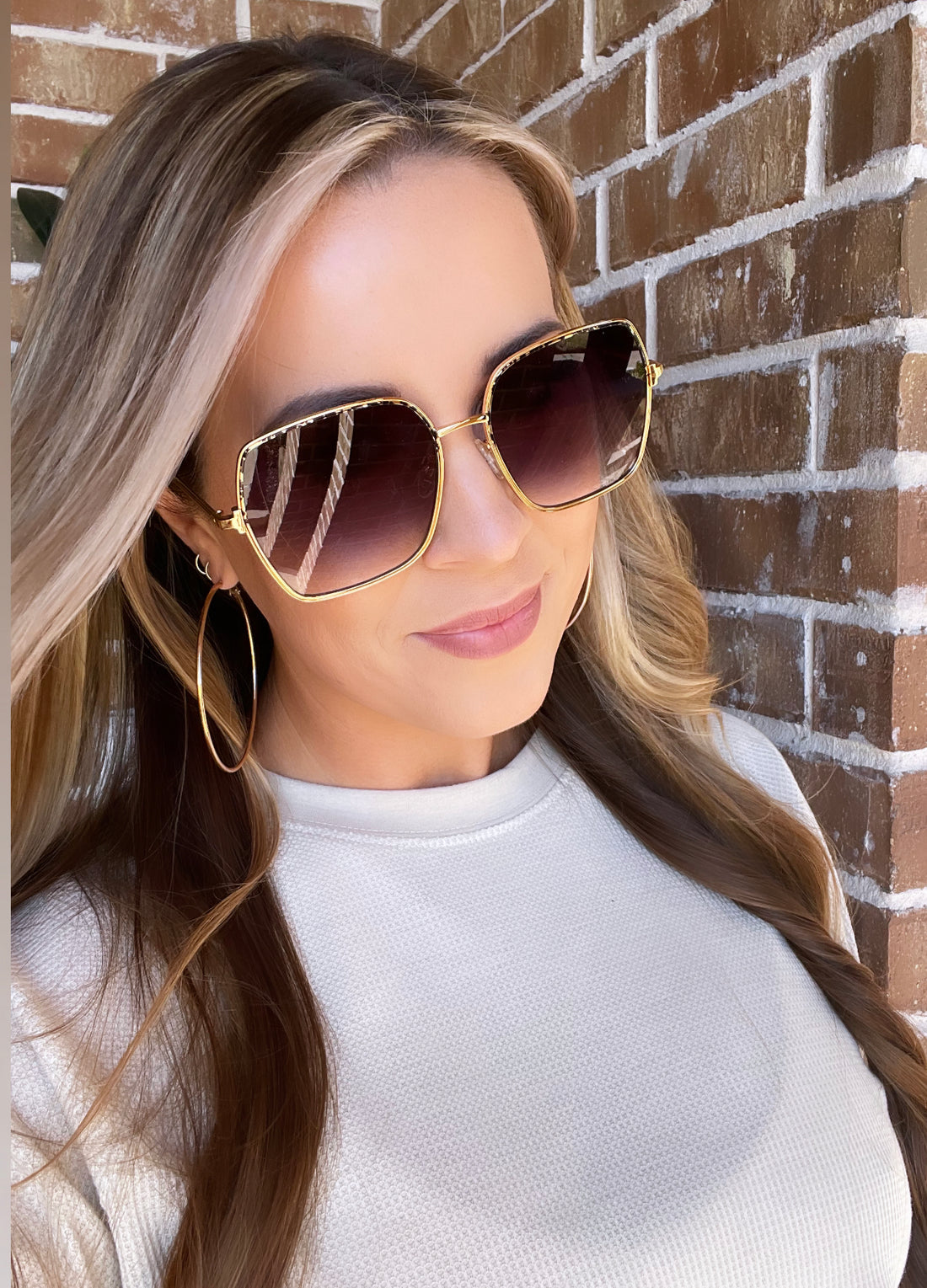 Dax Ella Sunglasses in classic style, available in small, medium, and large sizes.