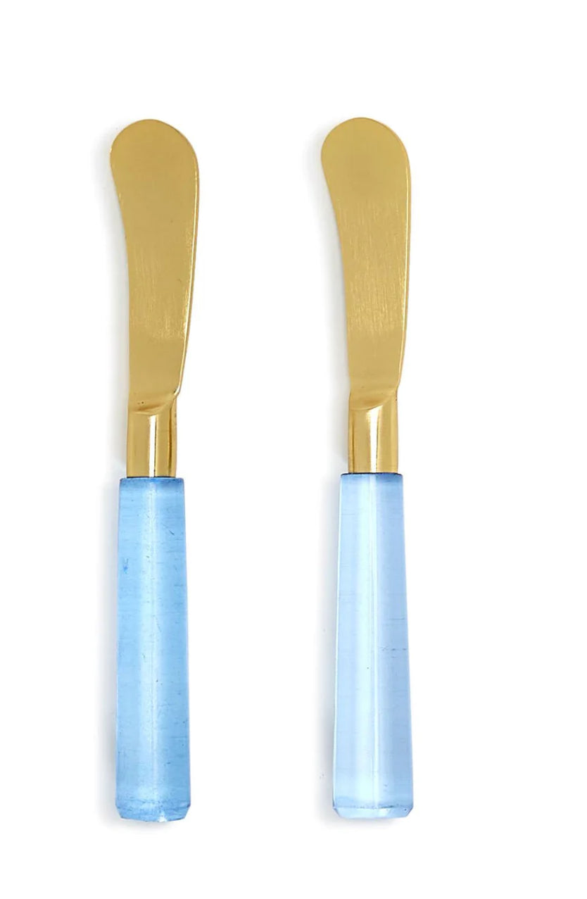 Two Blue Skies Spreaders with gold blades and glossy light blue handles. Available sizes: 5", 6", and 7".