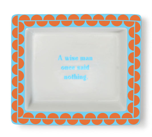 White porcelain desk tray, orange and blue border, "A wise man once said nothing" in blue. Size: 6"x4".