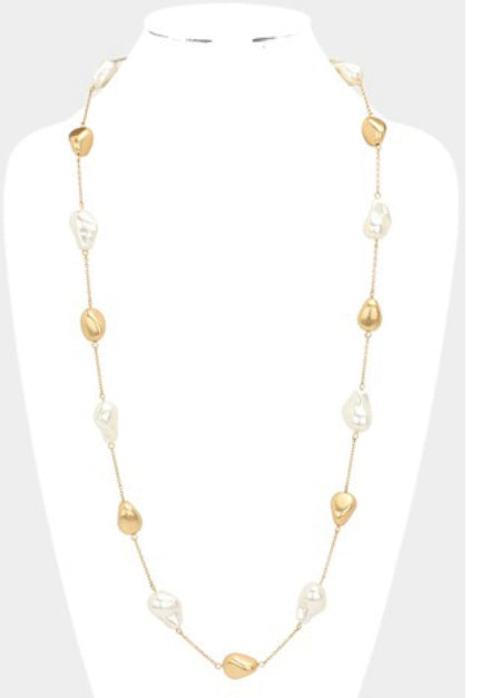 The Pearl Abstract Metal Long Necklace with alternating irregular gold and pearl-like beads. Available in 18", 20", and 24" lengths.