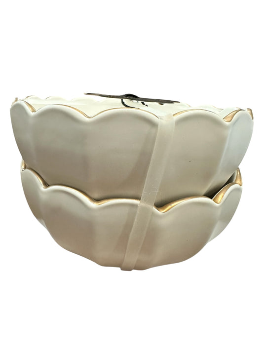 Two white scalloped bowls with gold rim, stacked and held by cream elastic band. Available in small and large sizes.