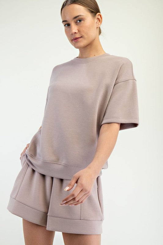 Loose-fitting light mauve Modal Scuba Top, available in sizes XS-XL.