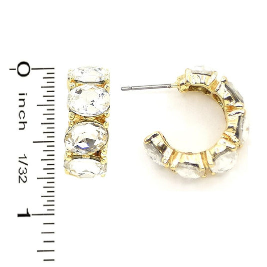 Gold-plated Quin Earrings with large oval-cut clear gemstones, approx. 1 inch diameter. Sizes available not specified.