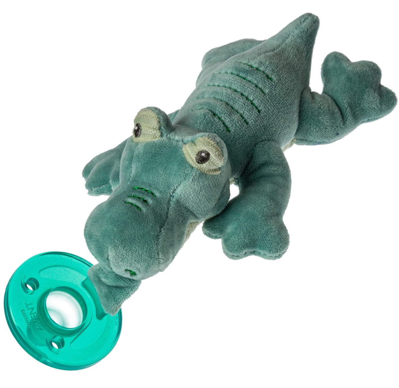A plush toy of a green alligator with a whimsical face, holding a round, teal-colored WubbaNub Pacifier in its mouth, isolated on a white background.