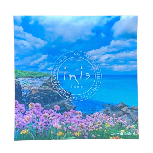 Inis Seascape Sachet: coastal scene, purple wildflowers, "ini's home" text. Cornwall-inspired. Available in single or 3-pack.