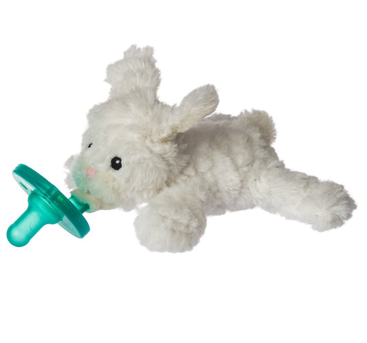 A plush white stuffed bunny toy with a WubbaNub Pacifier pacifier in its mouth, isolated on a white background.