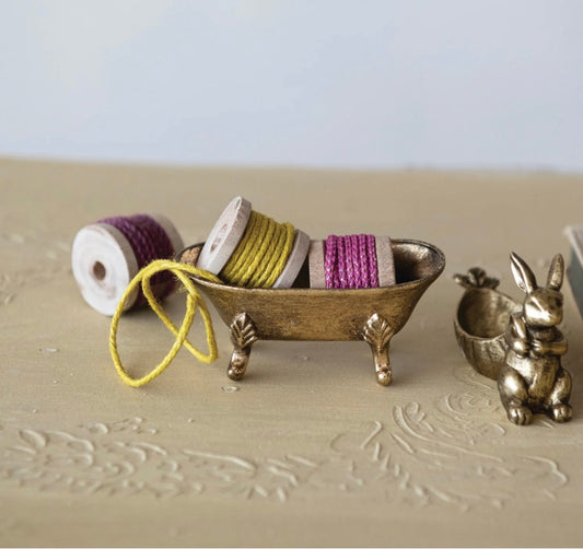 Decorative pewter dish with rabbit antique gold finish holding thread spools. Available in small, medium, and large sizes.