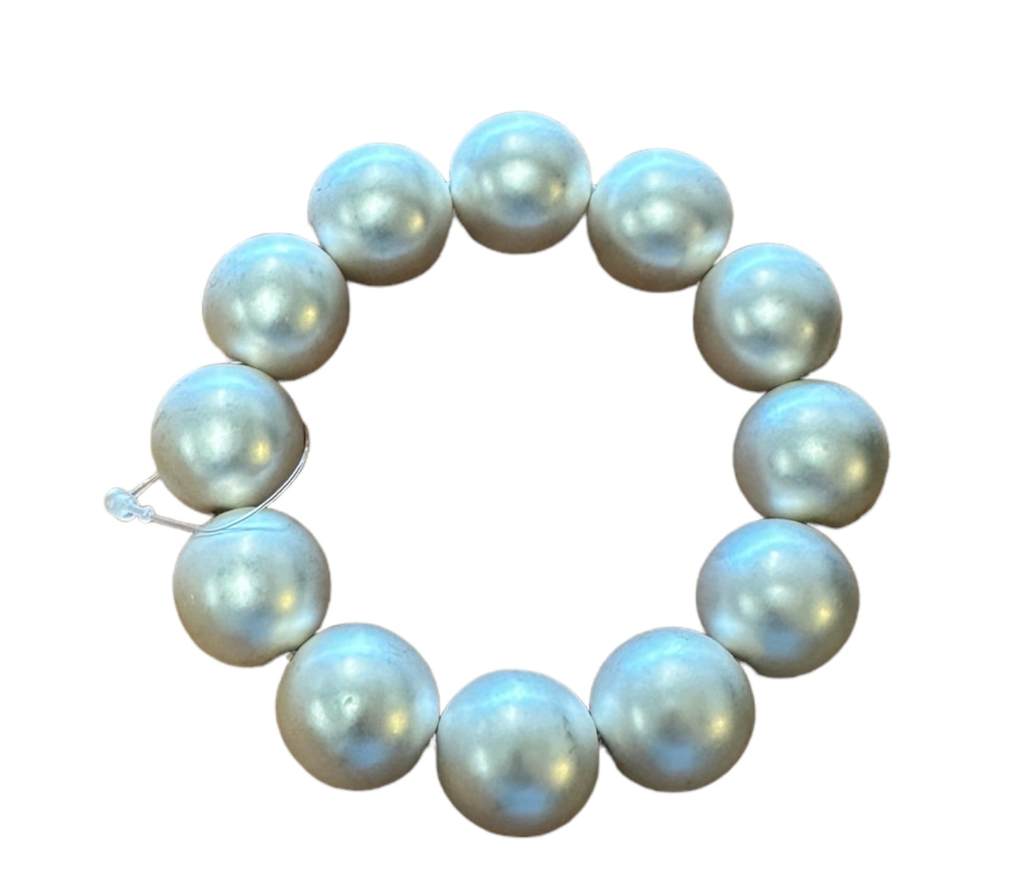Ball Beaded Bracelet with large, shiny 20mm light gray beads on transparent elastic cord; available in size 20mm.