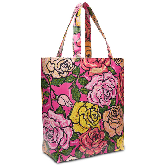 Colorful tote with floral print on bright pink ConsuelaCloth, two handles, rectangular. Available in small and medium sizes.