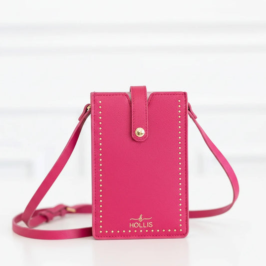 Beige crossbody purse with gold studs, snap closure, "HOLLIS" logo. Available in one size. Fits most cell phones.