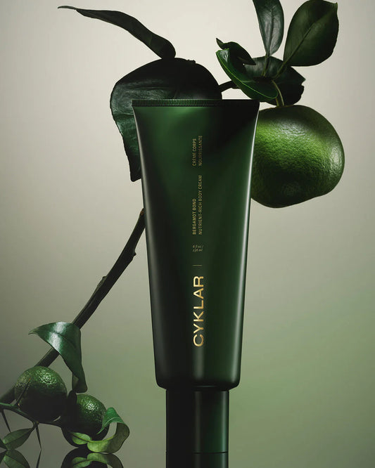 Dark green tube of Bergamot Body Cream | Cyklar, available in 100ml and 200ml sizes.