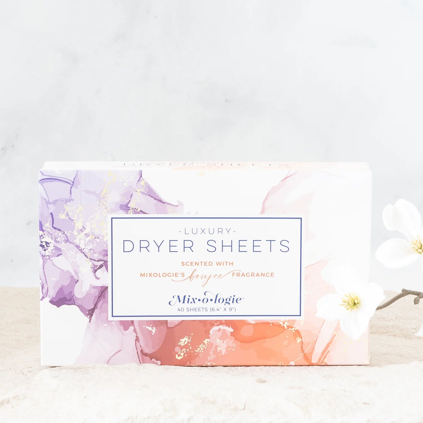 Pastel “Luxury Dryer Sheets | Mix O Logie” box with floral design. Fresh scent, reduces static. Available in 80 & 160 count sizes.