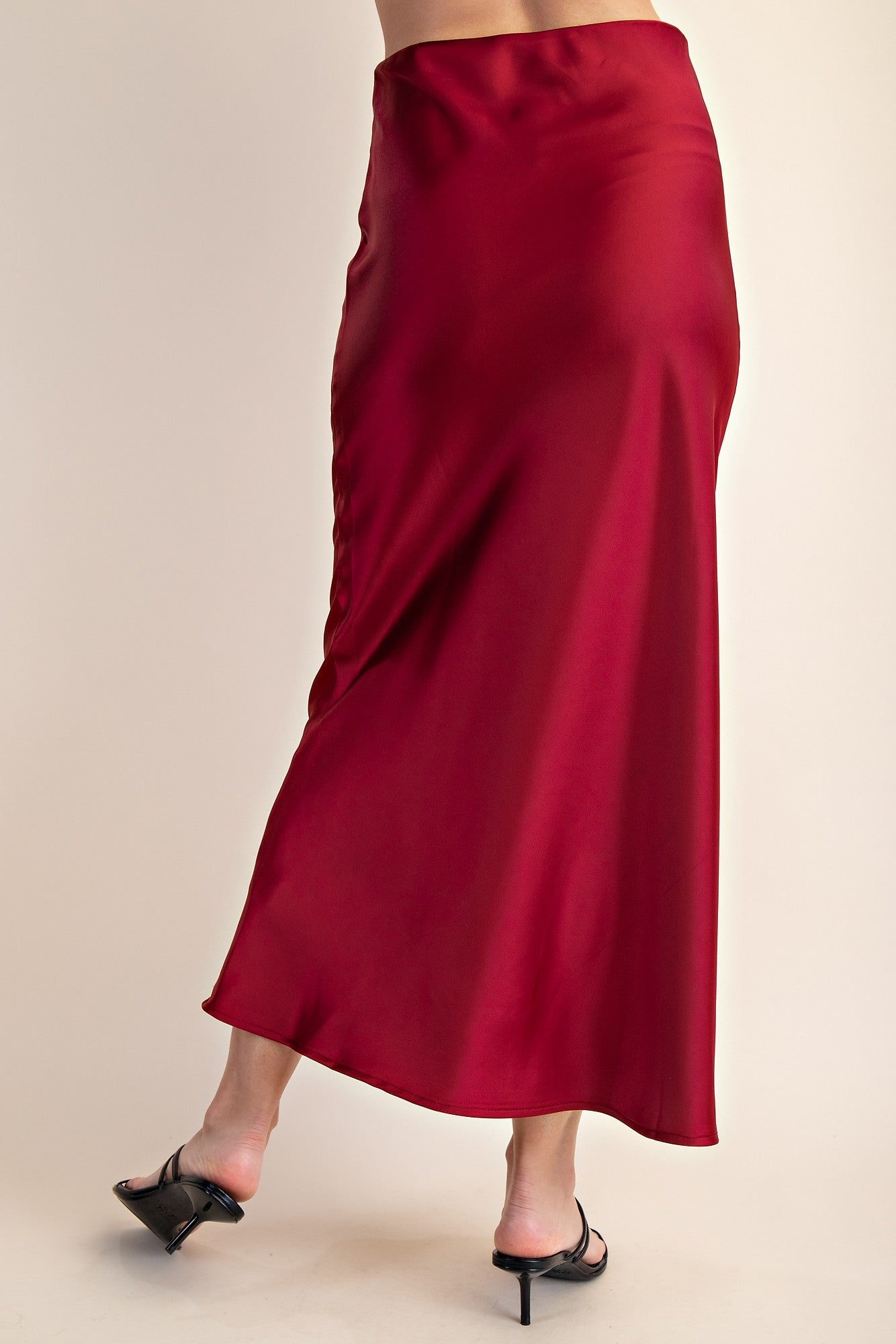 Sally Satin Midi Skirt in shiny red, available in sizes XS-XL. Sleek, bold, perfect for a night out.