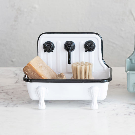 Metal sink-shaped soap dish with faucet in white and black. Available in small, medium, and large sizes.