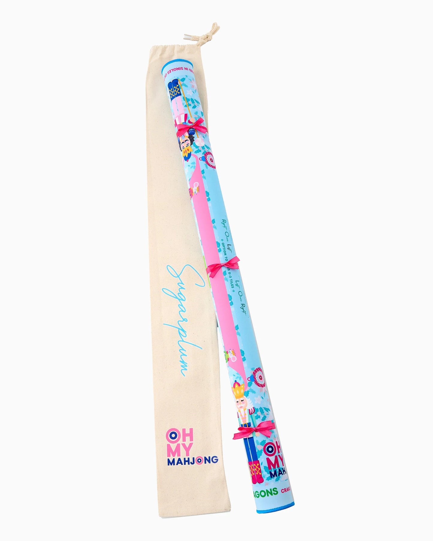Mahjong Sugarplum Mat with festive cartoon designs, rolled and tied with pink ribbons. Made of neoprene. Available in standard and large sizes.