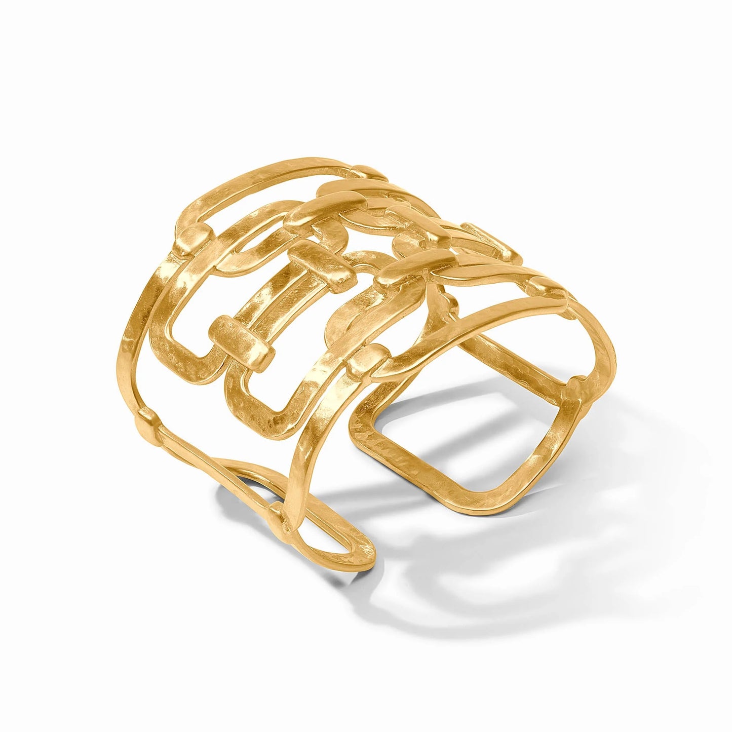 Wide openwork gold cuff with abstract interlocking geometric design; available in small, medium, and large sizes.