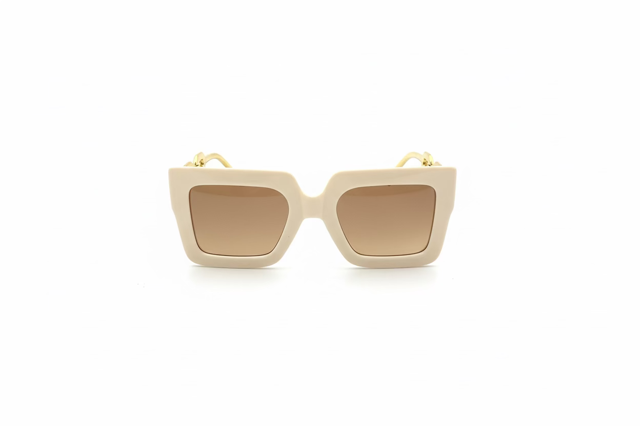 Cream square sunglasses with gold frames and brown-tinted UV protection lenses. Available in small, medium, and large sizes.