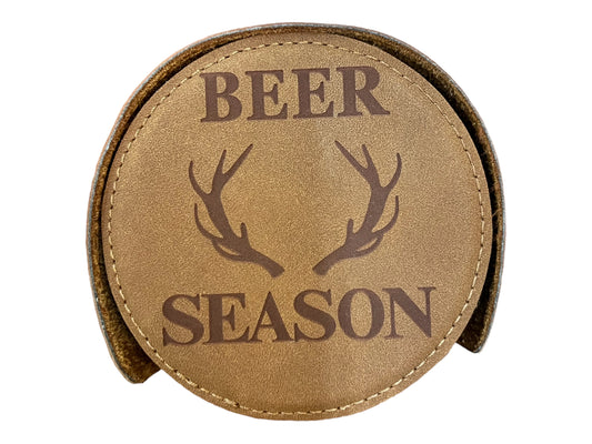 Round brown leather coaster with "BEER SEASON" and deer antlers engraving. Available in 4-inch and 6-inch sizes.