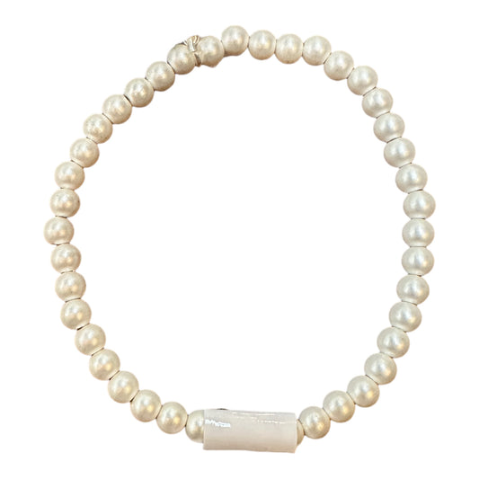 Matte Silver Bracelet: stretch design, uniform white pearls, rectangular white clasp. Available in S, M, L sizes.