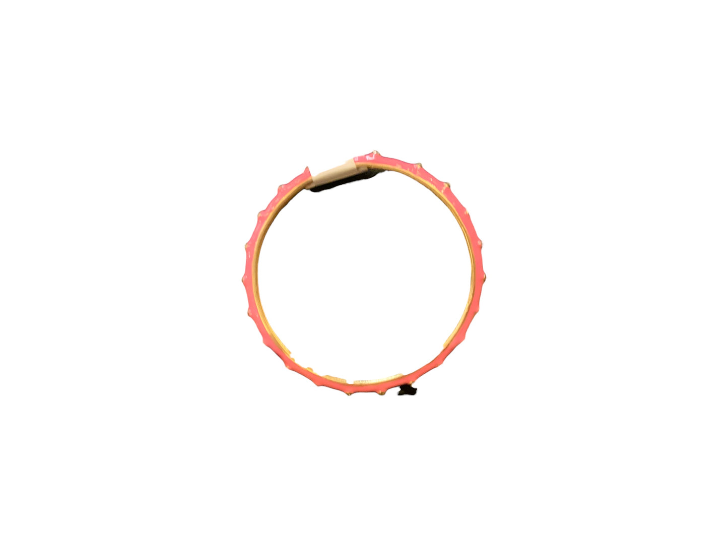 Blush Lucy Bracelet with circular shape, red jagged edge, beige inner ring; available in small, medium, and large sizes.