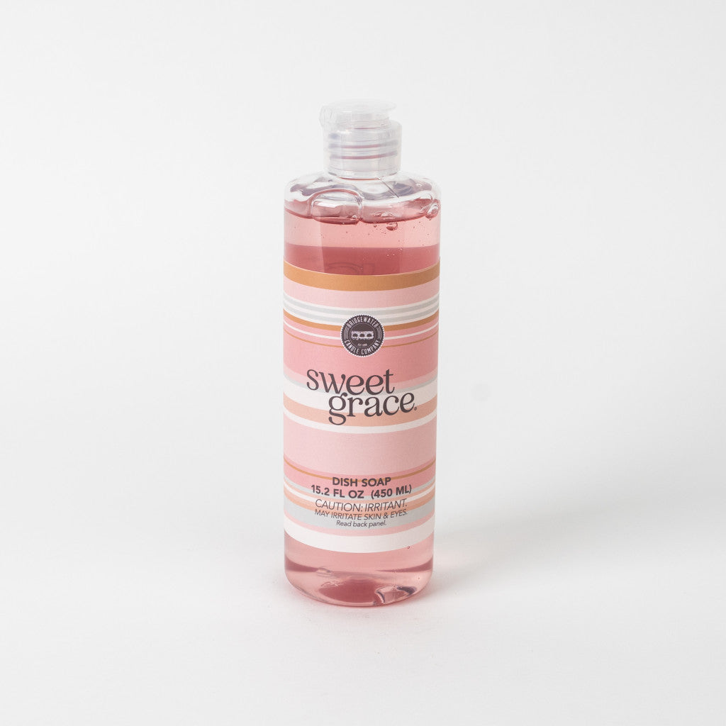 Sweet Grace Dish Soap in clear bottle with pink liquid, flip cap, striped label; available in multiple sizes.