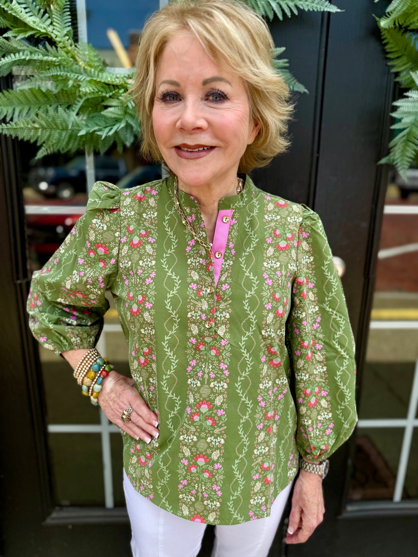 Green floral Lia Top with 3/4 puff sleeves. Available in sizes XS-XL.