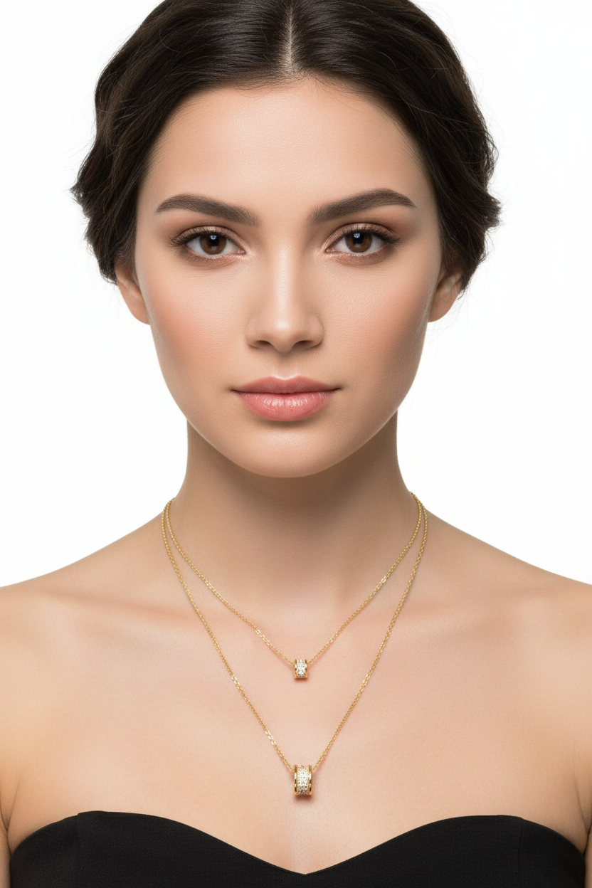 Gold Dipped Cubic Zirconia Double Strand Necklace with rectangular and cubic pendants. Available in 16" & 18" lengths.