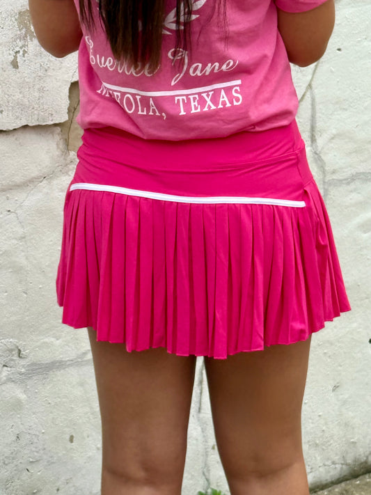 Play It Bold Pleated Active Skort in hot pink. Available in sizes XS-XL.