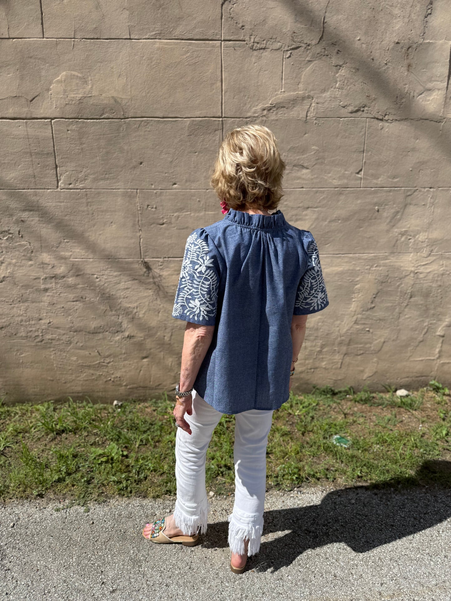 Denim Floral Top with short sleeves. Available in sizes XS–XL.
